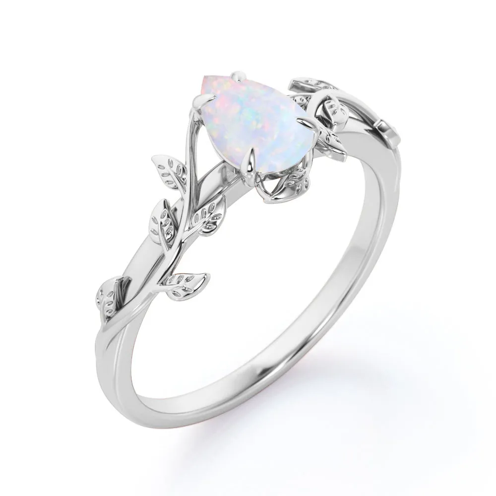 1 carat Pear cut Ethiopian Opal Vintage Engagement ring in Yellow gold