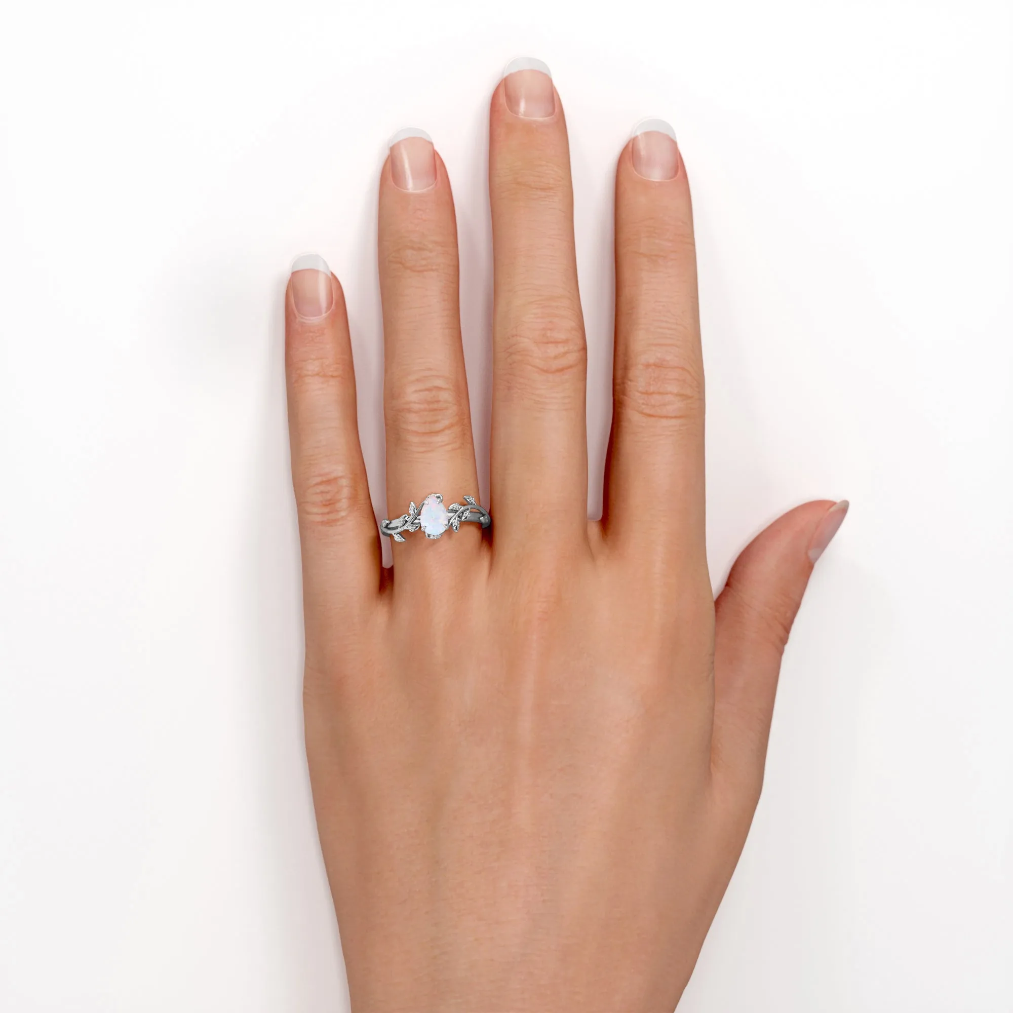 1 carat Pear cut Ethiopian Opal Vintage Engagement ring in Yellow gold