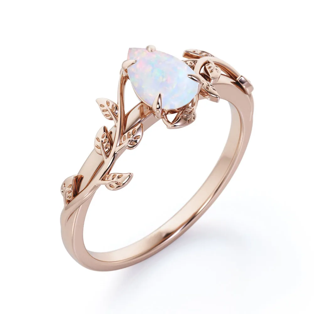 1 carat Pear cut Ethiopian Opal Vintage Engagement ring in Yellow gold