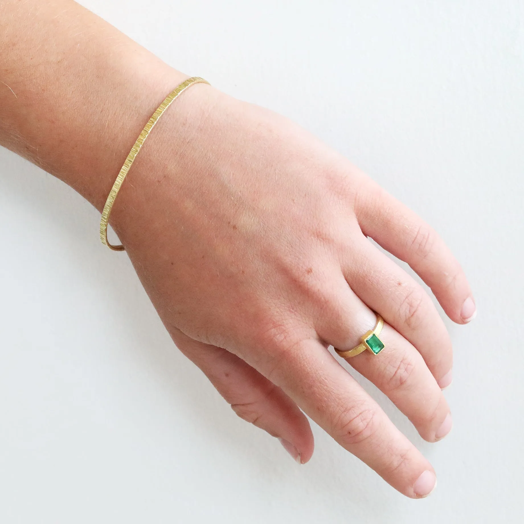 18K Gold Narrow Bangle Bracelet with Linear Hammer Marks