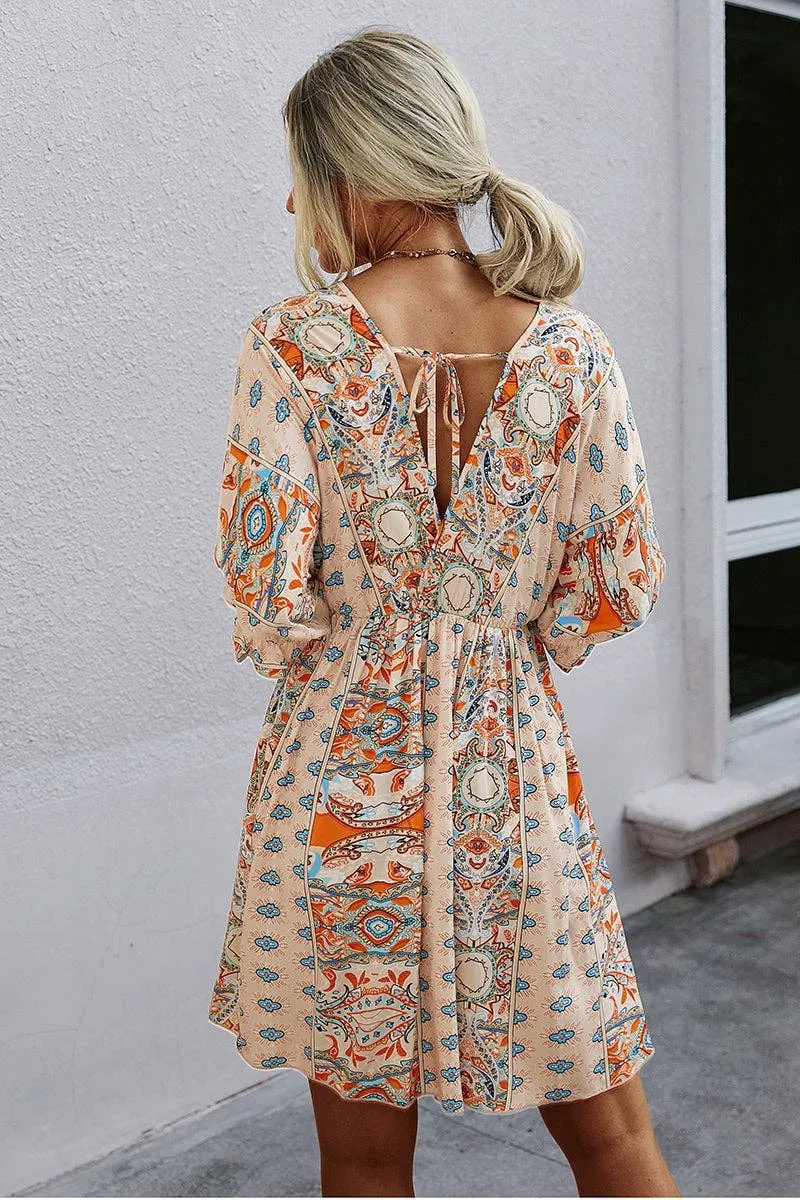 Beige Boho Print Wrap Neck Tie Back Pleated Hem Dress