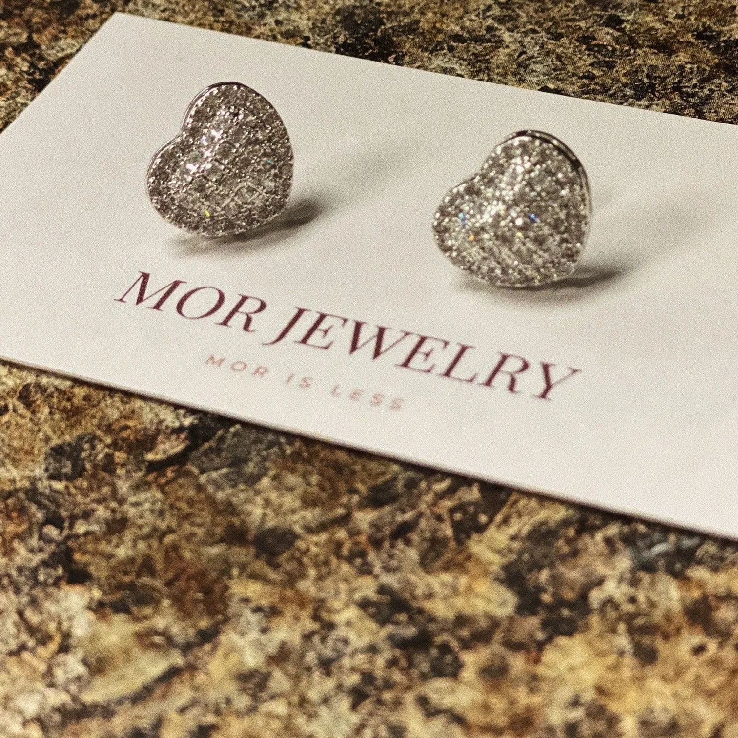 Diamond heart stud earrings