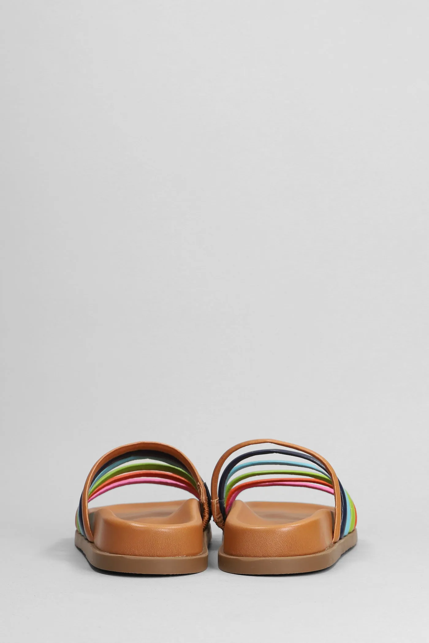 Flats in brown leather