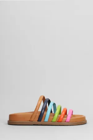 Flats in brown leather