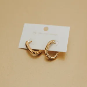 Flirty Fantasy Oval Hoop Earrings by Pretty Simple