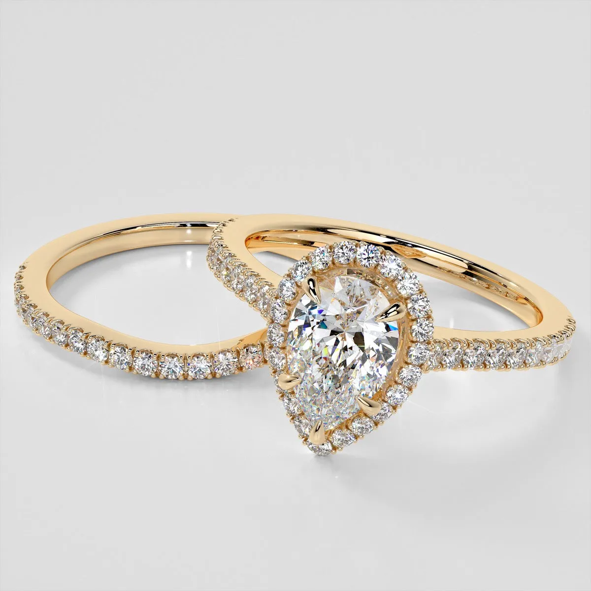 Pear Cut Halo Wedding Set With Accents