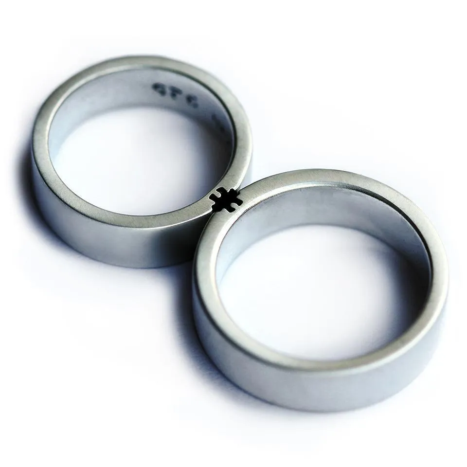 Puzzle matching couple rings set