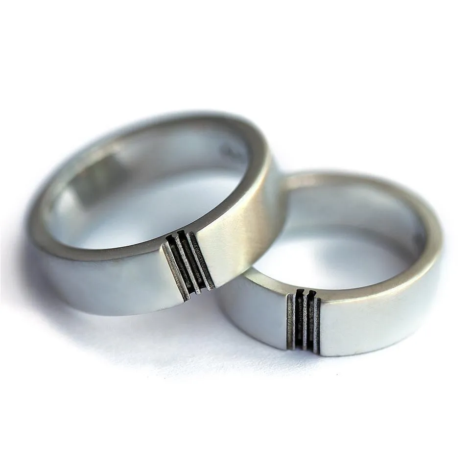 Puzzle matching couple rings set